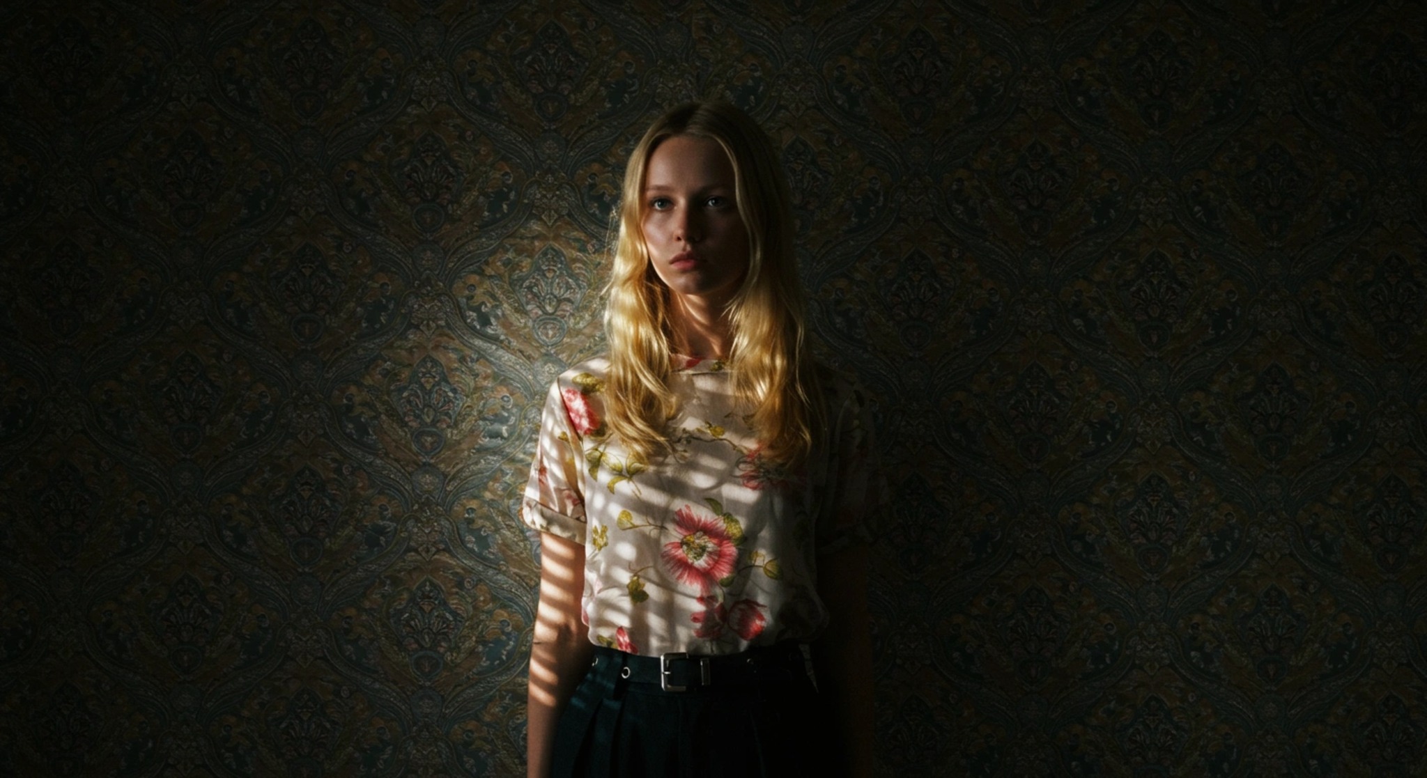 Model Against Patterned Background Free image: Young woman in floral shirt standing against patterned wall ...