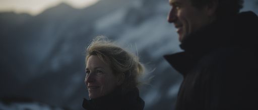 Golden hour winter couple portrait in the alps